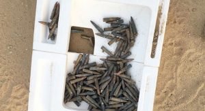 60 طلقة مدفونة في صناعية الجهراء