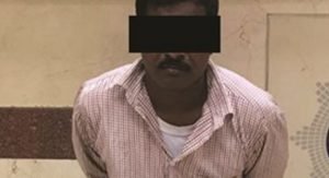 ضبط آسيوي يحمل كرتون خمور في خيطان