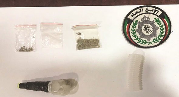 مواطنة وعراقي وأردني في جلسة تعاط بشوارع جنوب الصباحية